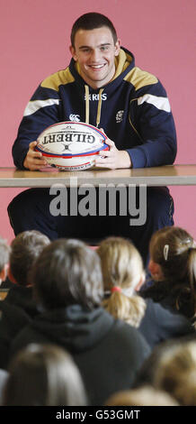 Scotland 7s player Adam Ashe returns to his former school, Alva Primary School in Clackmannanshire, to meet pupils ahead of the Emirates Airline Glasgow 7s. Stock Photo