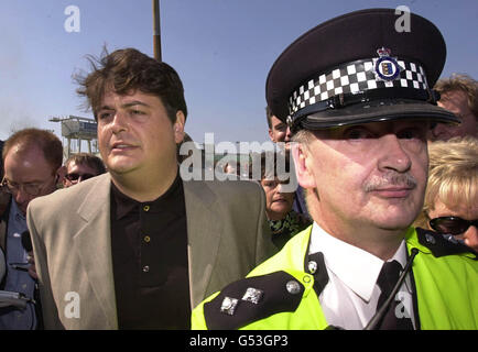 Former MI5 employee David Shayler is arrested as he arrives at Dover. The renegade secret agent is claiming victory in his battle against the Government and security services on his return to Britain to face charges under the Official Secrets Act. *... The former MI5 intelligence officer claimed the Metropolitan Police Service was investigating his allegations that MI6 was behind a plot to assassinate Libyan leader Colonel Gaddafi that left several civilians dead. Stock Photo