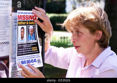 Belinda Enderby putting up a poster of her son and his father, both called Simon Price. Police fear the father may have disappeared abroad with the baby, sparking off an international hunt for him and the 15-month-old. Police have issued an all ports warning. * ...and alerted Interpol about the pair. Stock Photo