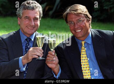 Chief Executive Simon Burridge (R) and John Jackson, Co-Head of the bidding team for the People's Lottery consortium. The Lottery Commission announced that the People's Lottery now has one month to satisfy the commission. * They could not accept also the existing operator Camelot's bid. Stock Photo