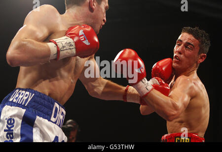 Boxing - Oldham Sports Centre. Derry Mathews and Anthony Crolla (right) in action during the BBBofC British lightweight title bout at the Sports Centre, Oldham. Stock Photo