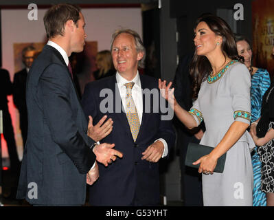 The Duke and Duchess of Cambridge talk to Charlie Mayhew (centre) of Tusk Trust as they attend the African Cats UK film premiere held at the BFI Southbank, London. PRESS ASSOCIATION Photo. Picture date: Wednesday April 25, 2012. See PA story ROYAL Cambridge. Photo credit should read: Chris Jackson/PA Wire Stock Photo