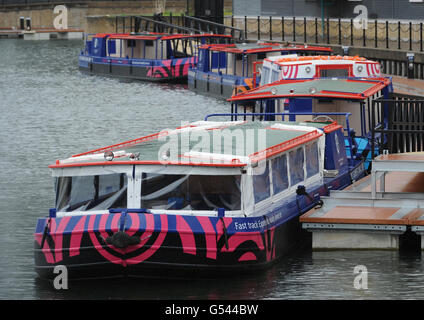 Olympic barges moored in the Limehouse Basin in east London today which will operate a ferry service to the Olympic Park from Limehouse and Tottenham Hale during the London 2012 Olympics. Stock Photo