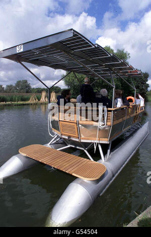 Britain's first passenger solar boat launched by the Broads Authority at How Hill, Norfolk. The 12-seater German-made Ra, is named after the Egyptian sun god. The 30ft long boat is powered by three rows of seven solar panels and cost 55,000. *will begin running guided trips around Barton Broad at Easter. Stock Photo