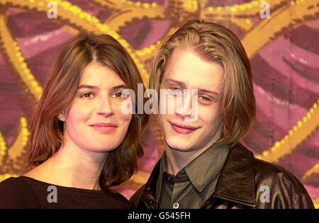 American actor Macaulay Culkin, who starred in the film Home Alone, with actress Irene Jacob at the Vaudeville Theatre in London. Culkin makes his West End acting debut in a new play by Richard Nelson, entitled Madam Melville. *... He plays Carl, a young American in Paris in 1966 who is seduced by the title character played by Jacobs. The play has its world premiere on October 18 2000. Stock Photo