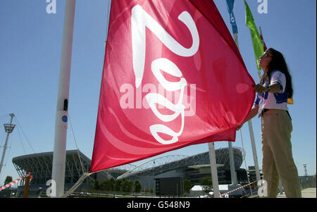 Olympic Preparation flags. Flags overlooking the Olympic Stadium in Homebush Bay, Sydney are checked, ahead of the start of the 2000 Olympic Games. Stock Photo