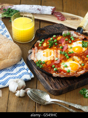 flamenco eggs, huevos a la flamenca, spanish andalusian cuisine Stock Photo