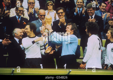 (l-r) West Germany's captain Franz Beckenbauer and goalkeeper Sepp Maier, with the World Cup after beating the Netherlands 2-1. Stock Photo