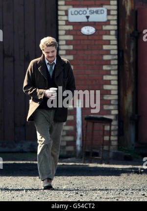 Colin Firth on set of the film The Railway Man being filmed at B'oness railway station in Central Scotland. Stock Photo