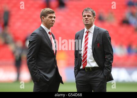 Liverpool's Jamie Carragher and Steven Gerrard (left) during the pre-match build-up Stock Photo