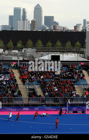 A general view of the match underway between Great Britain and Australia looking towards Canary Wharf during the Visa International Invitational Hockey Tournament at the Riverbank Arena, London. Stock Photo