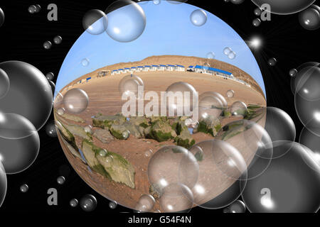 Circular view on a beach with bubbles against a black background. Digitally altered photo. The bubbles represent solar energy. Stock Photo