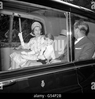 Queen Elizabeth II, with Prince Edward and the Duke of Edinburgh, as they left the Savoy Hotel, London, after a wedding reception. Stock Photo