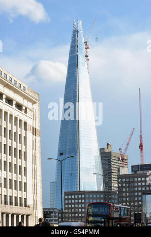 A general view of the Shard skyscraper under construction on the south bank of the River Thames.. A general view of the Shard skyscraper under construction on the south bank of the River Thames. Stock Photo