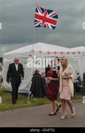 A day off work at Royal Ascot on The Heath side of the racecourse, cheaper and free entry. Union Jack flag flying. Ascot Berkshire England 2016 UK. 2010s.  HOMER SYKES Stock Photo