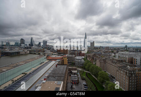 View east from the Tate Modern 10th floor viewing gallery past the Shard towards Canary Wharf in the distance. Stock Photo