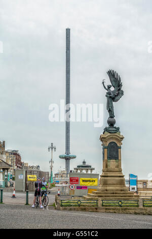 British Airways i360 162-metre (531 ft) observation tower being constructed on the seafront of Brighton. The Peace Statue in the Stock Photo
