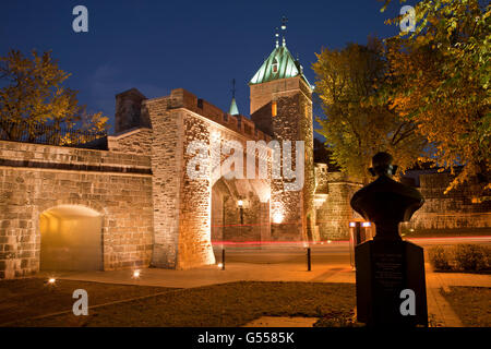 Canada, Quebec City, Old Quebec, tower and gate in city wall, 'Porte St. Louis' over Rue Saint-Louis, with bust of Gandhi Stock Photo