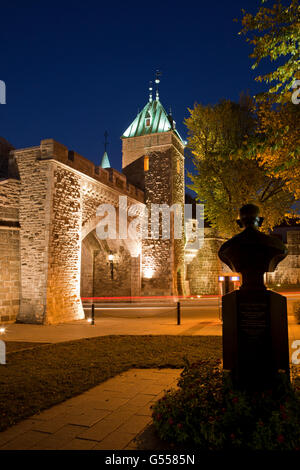 Canada, Quebec City, Old Quebec, tower and gate in city wall, 'Porte St. Louis' over Rue Saint-Louis, with bust of Gandhi Stock Photo