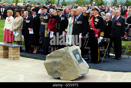 Dignitaries and public attend the new memorial commemorating the 255 British servicemen who died in the Falklands War, unveiled at the National Memorial Arboretum in Staffordshire. Stock Photo