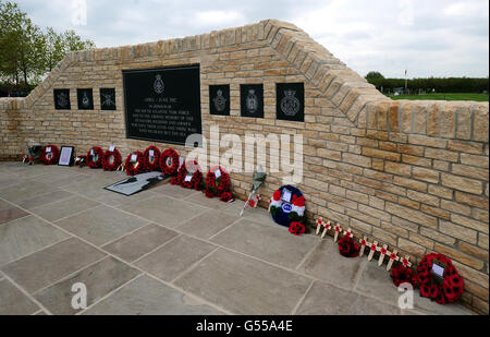 Wreaths layed at the new memorial commemorating the 255 British servicemen who died in the Falklands War, at the National Memorial Arboretum in Staffordshire. Stock Photo