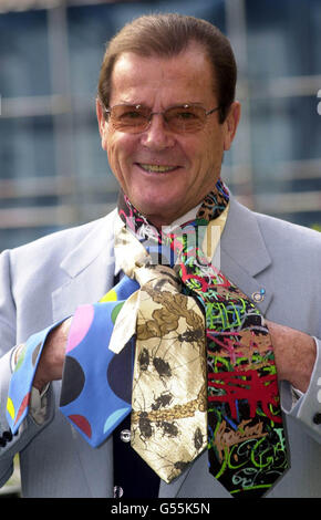 Actor and UNICEF patron Roger Moore wearing ties by Terry Frost, Makuta Aida and Jock McFadyen in central London for the project Cultural Ties. * The project involves 80 leading artists from around the world, designing ties and having 300 of each tie being sold at exclusive outlets worldwide. A charity auction in New York next year will sell the original designs and other works by the participating artist. An expected $1m is hoped to be raised for UNICEF's global Clean Water Development Campaign. Stock Photo