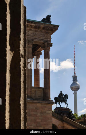 Berlin, Germany. Old National Gallery (Alte Nationalgalerie) with statue of Frederick William IV and the Fernsehturm (TV tower) Stock Photo