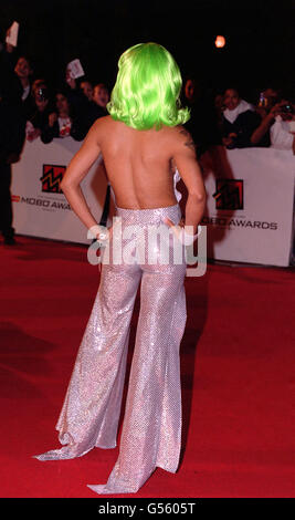 R'n'B artist and member of the American girl band TLC, Lisa left-eye Lopes, arrives to host the 5th MOBO (Music of Black Origin ) awards at the Alexandra Palace in London. Stock Photo