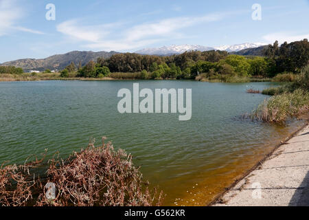 Agia reservoir, Chania, Crete, view over lake showing snow clad ...