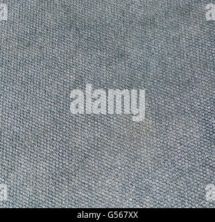 Surface of the fabric with dark gray felt with the texture of pressed cells. Stock Photo