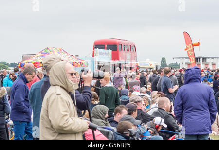 Cosford, UK. 19th June, 2016.  Red Arrows, Apache and Chinook helicopters, Typhoon and the Battle of Britain Memorial flight along with ground display’s were the attractions at the annual RAF Air Show, due to bad weather the RAF Falcons and the USAF B-52 Stratofortress were unable to make a show. Credit: Clifford Norton/Alamy Live News Stock Photo