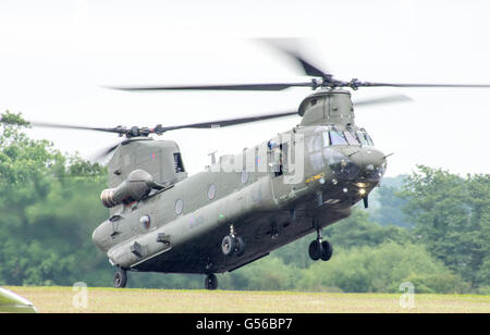 Cosford, UK. 19th June, 2016.  Red Arrows, Apache and Chinook helicopters, Typhoon and the Battle of Britain Memorial flight along with ground display’s were the attractions at the annual RAF Air Show, due to bad weather the RAF Falcons and the USAF B-52 Stratofortress were unable to make a show. Credit: Clifford Norton/Alamy Live News Stock Photo