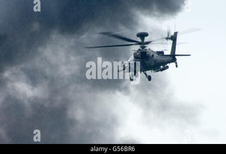 Cosford, UK. 19th June, 2016.  Red Arrows, Apache and Chinook helicopters, Typhoon and the Battle of Britain Memorial flight along with ground display’s were the attractions at the annual RAF Air Show, due to bad weather the RAF Falcons and the USAF B-52 Stratofortress were unable to make a show. Credit: Clifford Norton/Alamy Live News Stock Photo