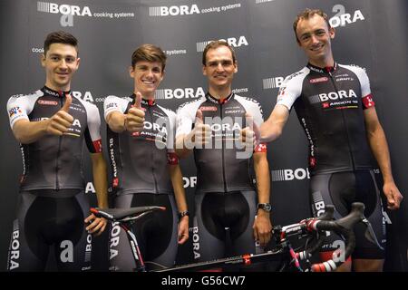 Duesseldorf, Germany. 20th June, 2016. Emanuel Buchmann (l-r), Patrick Konrad, Paul Voss and Andreas Schillinger from cycle team Bora-Argon 18 pose during their introductory press event for the Bora - Argon 18 team for the Tour de France in Duesseldorf, Germany, 20 June 2016. At this year's Tour de France running from July 2 to 24 those from the second division will take part thanks to a wildcard. Photo: MAJA HITIJ/dpa/Alamy Live News Stock Photo