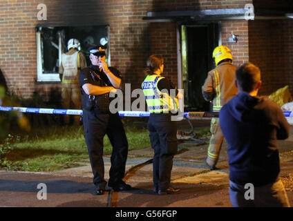 Christchurch, Dorset, UK. 20th June, 2016. Dorset Police were called at 9.17pm today, Monday 20 June 2016, by the fire service to reports of a fire at an address in Druitt Road in Christchurch.  Initially it was reported that two children were still inside the address but it was quickly identified that they were staying with family elsewhere.  A puppy has been taken to a veterinary clinic for treatment.  An investigation is under way to establish the exact cause of the fire and a cordon is in place. Credit:  uknip/Alamy Live News Stock Photo