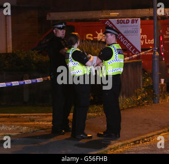 Christchurch, Dorset, UK. 20th June, 2016. Dorset Police were called at 9.17pm today, Monday 20 June 2016, by the fire service to reports of a fire at an address in Druitt Road in Christchurch.  Initially it was reported that two children were still inside the address but it was quickly identified that they were staying with family elsewhere.  A puppy has been taken to a veterinary clinic for treatment.  An investigation is under way to establish the exact cause of the fire and a cordon is in place. Credit:  uknip/Alamy Live News Stock Photo