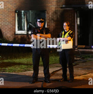 Christchurch, Dorset, UK. 20th June, 2016. Dorset Police were called at 9.17pm today, Monday 20 June 2016, by the fire service to reports of a fire at an address in Druitt Road in Christchurch.  Initially it was reported that two children were still inside the address but it was quickly identified that they were staying with family elsewhere.  A puppy has been taken to a veterinary clinic for treatment.  An investigation is under way to establish the exact cause of the fire and a cordon is in place. Credit:  uknip/Alamy Live News Stock Photo