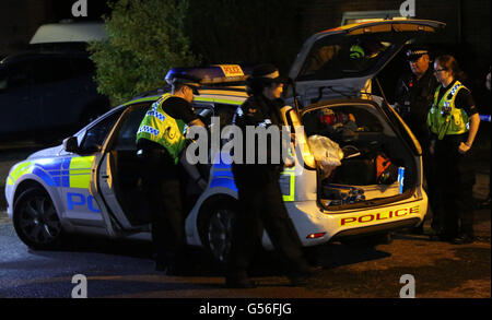 Christchurch, Dorset, UK. 20th June, 2016. Dorset Police were called at 9.17pm today, Monday 20 June 2016, by the fire service to reports of a fire at an address in Druitt Road in Christchurch.  Initially it was reported that two children were still inside the address but it was quickly identified that they were staying with family elsewhere.  A puppy has been taken to a veterinary clinic for treatment.  An investigation is under way to establish the exact cause of the fire and a cordon is in place. Credit:  uknip/Alamy Live News Stock Photo