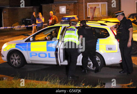 Christchurch, Dorset, UK. 20th June, 2016. Dorset Police were called at 9.17pm today, Monday 20 June 2016, by the fire service to reports of a fire at an address in Druitt Road in Christchurch.  Initially it was reported that two children were still inside the address but it was quickly identified that they were staying with family elsewhere.  A puppy has been taken to a veterinary clinic for treatment.  An investigation is under way to establish the exact cause of the fire and a cordon is in place. Credit:  uknip/Alamy Live News Stock Photo