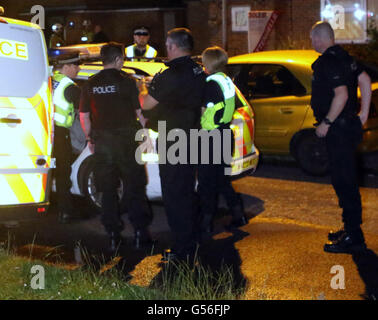 Christchurch, Dorset, UK. 20th June, 2016. Dorset Police were called at 9.17pm today, Monday 20 June 2016, by the fire service to reports of a fire at an address in Druitt Road in Christchurch.  Initially it was reported that two children were still inside the address but it was quickly identified that they were staying with family elsewhere.  A puppy has been taken to a veterinary clinic for treatment.  An investigation is under way to establish the exact cause of the fire and a cordon is in place. Credit:  uknip/Alamy Live News Stock Photo