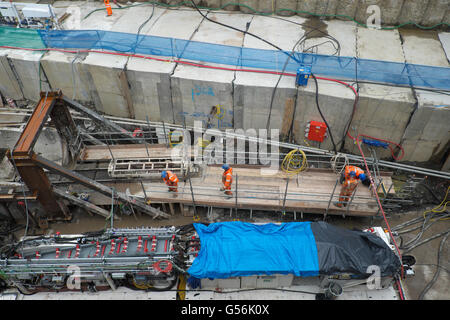 Bleddfa, Powys, Wales, UK - Tuesday 21st June 2016 - Severn Trent Water have now started tunnelling at Bleddfa on a 1.8km tunnel bypass alongside the current 73 mile 100 year old Elan Valley Aqueduct that carries water from Mid Wales to the city of Birmingham. Here workers stand alongside the concrete encased original conduit. The work is being carried out by the BNM Alliance comprising of Barhale and North Midland Construction. Work is expected to be completed by December 2016. Two further tunnels will then be built at nearby Nantmel and Knighton. Credit:  Steven May/Alamy Live News Stock Photo