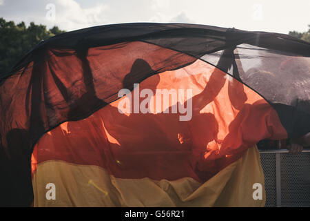 Berlin, Berlin, Germany. 21st June, 2016. German football fans as they watch the Euro 2016 football match between Germay and Northern Ireland in a fan zone in front of Brandenburg Gate in Berlin. Credit:  Jan Scheunert/ZUMA Wire/Alamy Live News Stock Photo