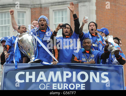 Chelsea players on the bus during the FA Cup and UEFA Champions League trophy parade in London. Stock Photo