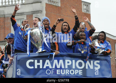 Soccer - Chelsea UEFA Champions League and FA Cup Parade - London. Chelsea players on the bus during the FA Cup and UEFA Champions League trophy parade in London. Stock Photo