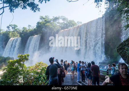 Iguazu Falls, Lots of tourists on Walkway, Argentina Stock Photo