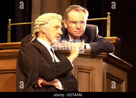 Lord Archer, (right) rehearses the role of Patrick Sherwood, a cardiologist suspected of murdering his wife, in his play The Accused, a courtroom drama which invites the audience to act as jury, with Edward Petherbridge as Sir James Barrington QC. * The show moves to the Theatre Royal Haymarket, in London's West End. ** Lord Archer was found guilty at the Old Bailey Thursday July 19, 2001 on a total of four charges of perjury and perverting the course of justice in relation to his 1987 libel case against the Daily Star. He was cleared on another count of perverting the course of justice. His Stock Photo