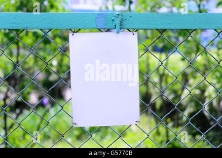 template empty blank plate on net fence Stock Photo
