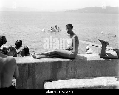Actress and comedic performer, Beatrice Lillie, sunbathing at Cap d'Antibes, France. She is married to Sir Robert Peel. Stock Photo