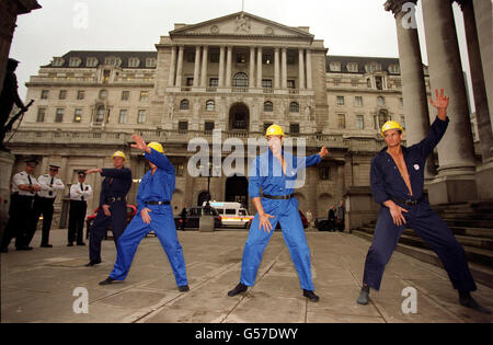 Sacked General Municipal Workers Union manufacturing workers (L-R) Lee Kindon from Wigan, Michael Stratton from Nottingham, Prince Green from Manchester and Owen Charles from Sheffield doing a 'Full-Monty' style protest on the steps of the Bank of England. * London, as part of a Union campaign to force a cut in the level of interest rates - urging The Bank to 'get 'em down'. Stock Photo