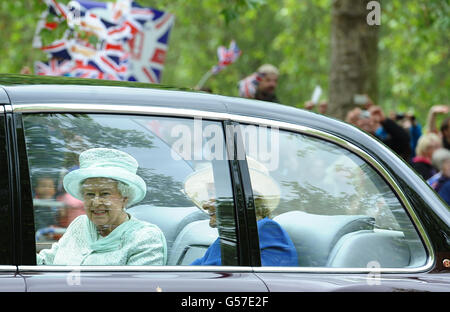 Queen Elizabeth II drives down the Mall with Diana Marion, The Lady Farnham, on her way to St Paul's Cathedral. Stock Photo